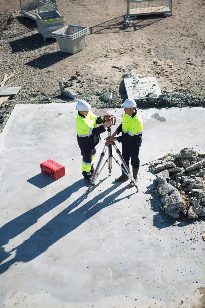High angle view of site manager and surveyor