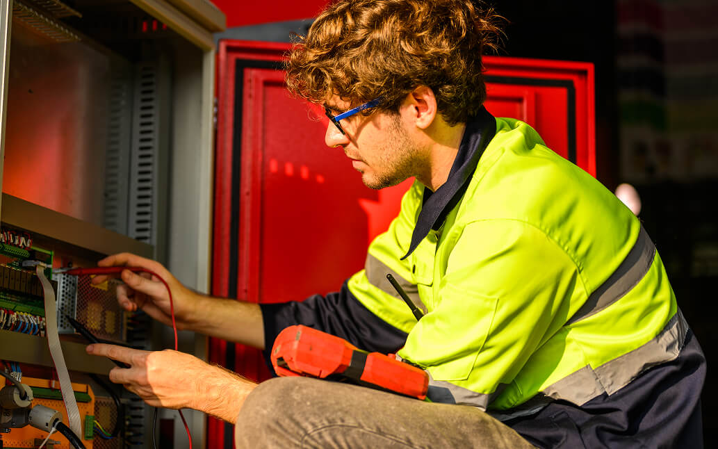 Mechanical engineer technician checking and inspecting some electrical unit